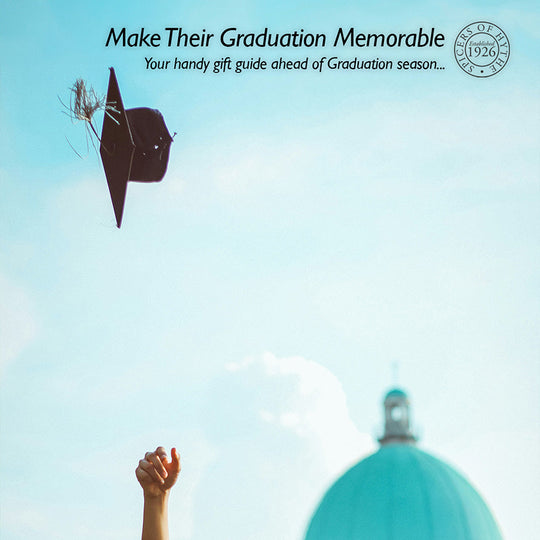 A Graduation hat being thrown into the air with the sky in the background